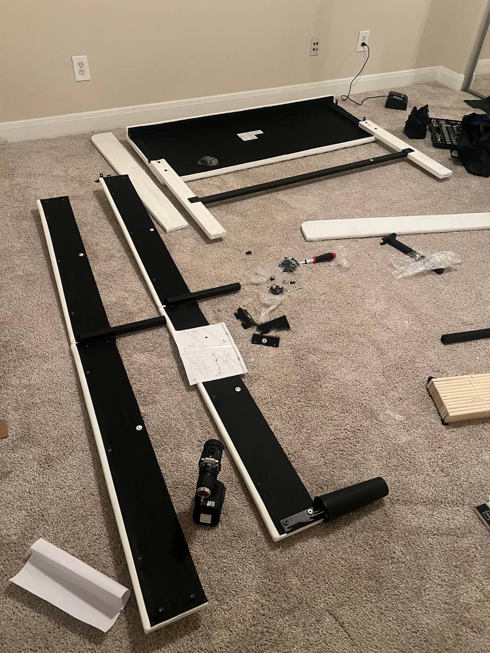 Bed frame parts laid out before assembly