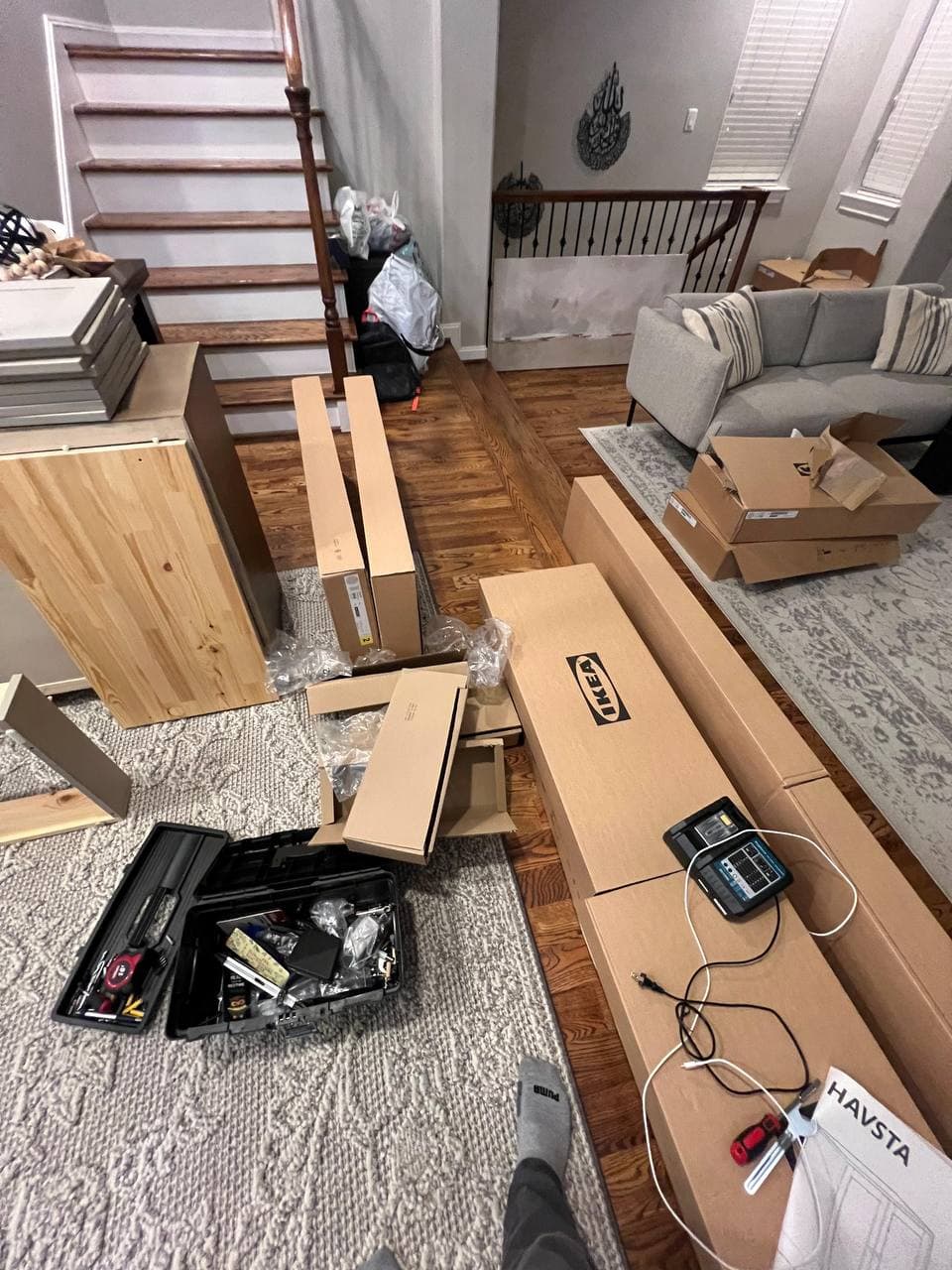 IKEA flat-pack furniture boxes before assembly in Houston home