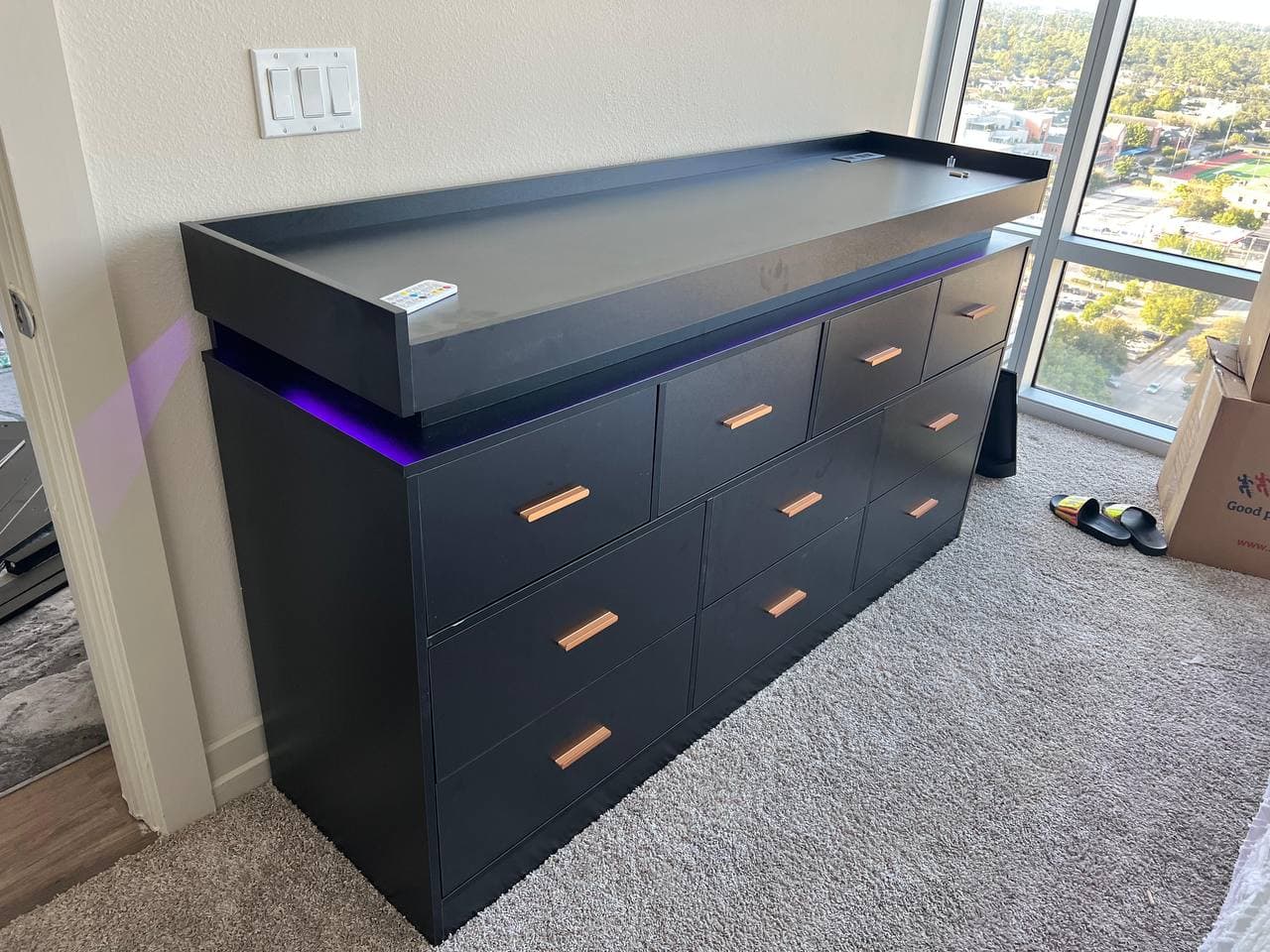 LED dresser with 9 drawers assembled in Houston bedroom