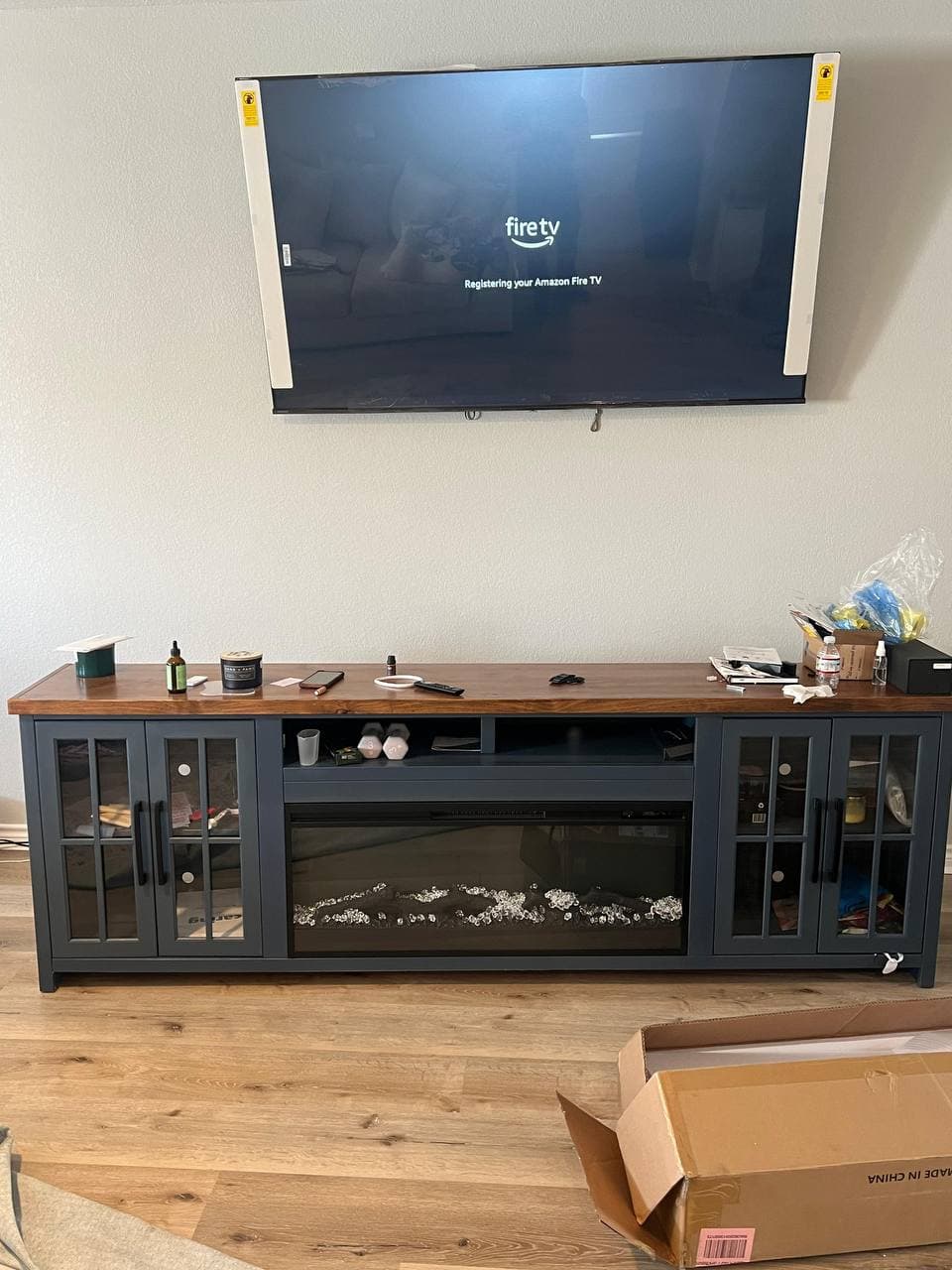 TV wall mount and entertainment center assembled in Houston living room